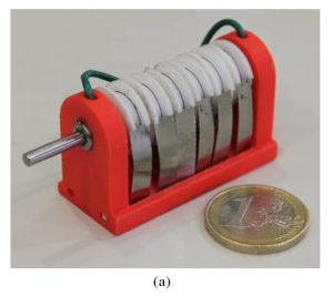 DESIGN AND CHARACTERIZATION OF A CONTINUOUS ROTARY MINIMOTOR BASED ON SHAPE MEMORY WIRES AND OVERRUNNING CLUTCHES